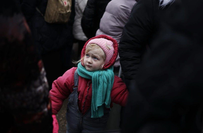  Ukrainian refugees at the Palanca crossing at the border with Moldova, March 3, 2022.  (photo credit: AVISHAG SHAAR YASHUV/IFCJ)