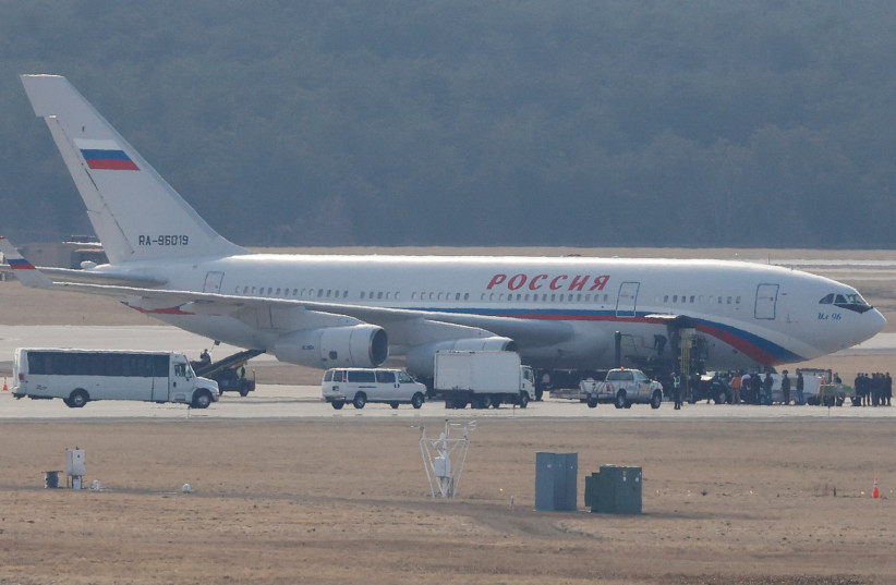  A Russian government plane is serviced on a runway in the process of collecting expelled Russian diplomats at Dulles international airport in Chantilly, Virginia, US on March 5, 2022. (photo credit: REUTERS / JONATHAN ERNST)