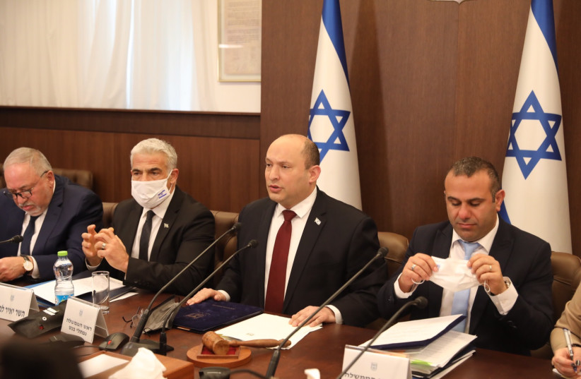  Finance Minister Avigdor Liberman, Foreign Minister Yair Lapid, and Prime Minister Naftali Bennett, 3/6/2022. (photo credit: MARC ISRAEL SELLEM)