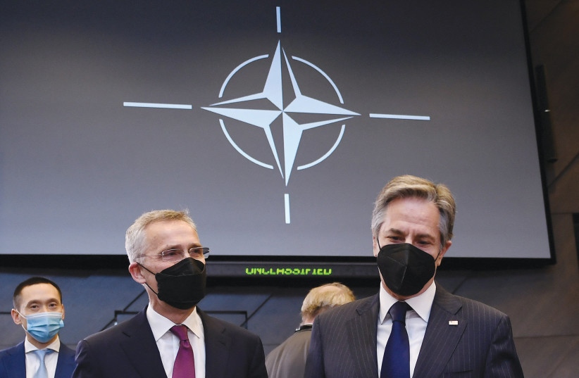  US SECRETARY of State Antony Blinken and NATO Secretary General Jens Stoltenberg participate in a meeting of foreign ministers of the North Atlantic Council at NATO headquarters in Brussels on Friday. (photo credit: Olivier Douliery/Reuters)