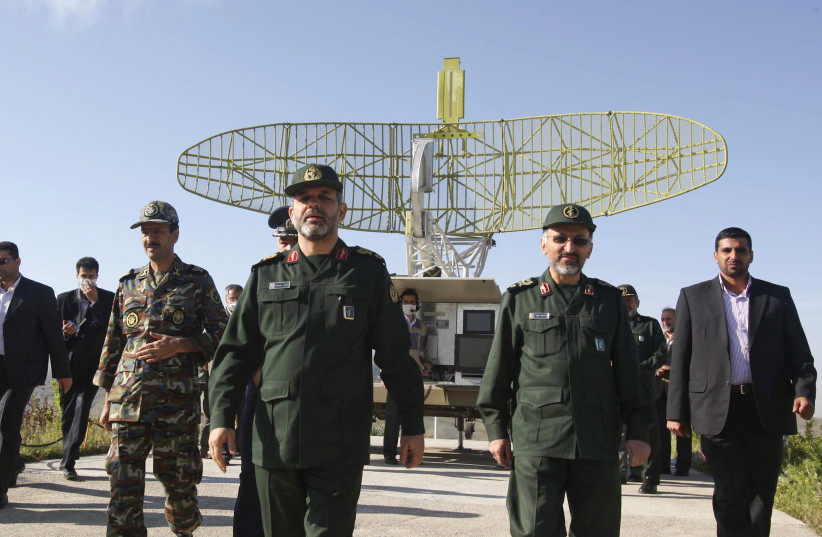 Iran's Defense Minister Ahmad Vahidi (3rd R) walks during a ceremony to unveil Iran's medium range anti-aircraft air defense system Mersad (Ambush) in Tehran, April 11, 2010. (credit: REUTERS/VAHID ALAEE/DEFENCE MINISTRY/HANDOUT)