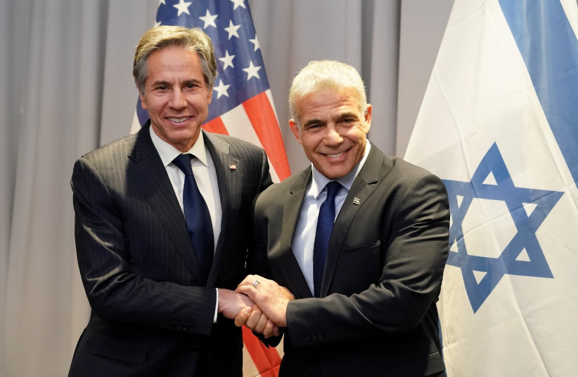  US Secretary of State Antony Blinken and Israeli Foreign Minister Yair Lapid in Riga, Latvia, March 7, 2022.  (photo credit: EDITS PALENS)