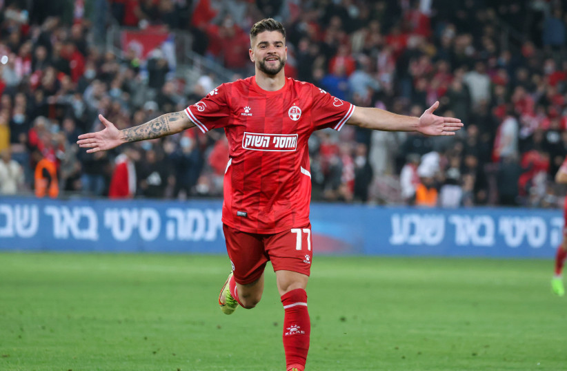 HAPOEL BEERSHEBA forward Rotem Hatuel celebrates after his late goal secured his side a 3-1 Premier League victory over Hapoel Haifa on Sunday night. (photo credit: DANNY MARON)