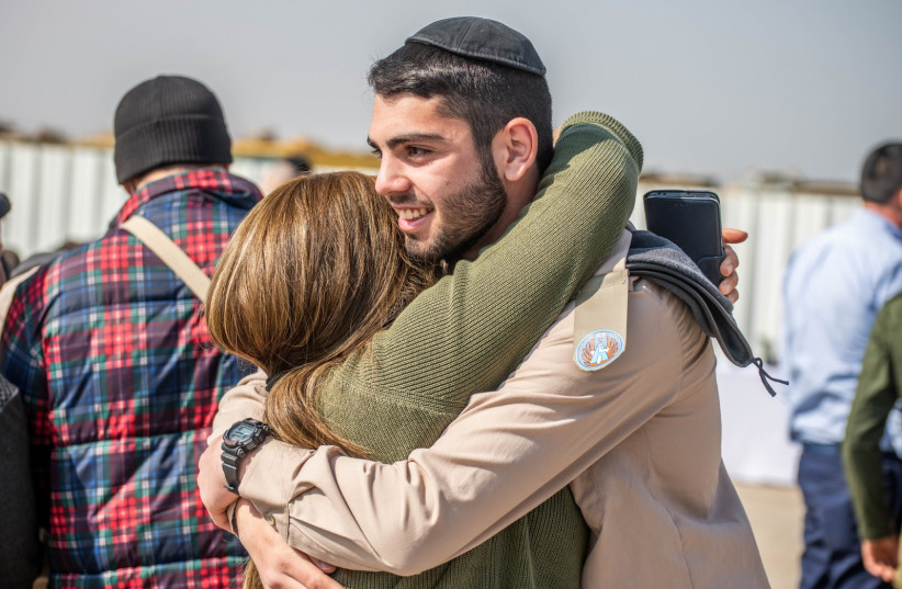  A haredi soldier is seen celebrating with family as he joins the Israeli Air Force. (photo credit: Roei Kor)