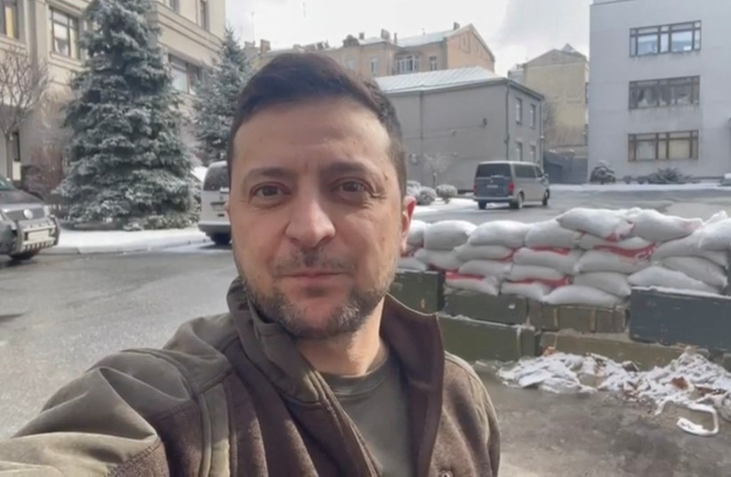  Ukrainian President Volodymyr Zelensky appears in a video statement with sand bags behind him, as the Russian invasion continues, in Kyiv, Ukraine March 8, 2022 in this still image obtained from social media.  (credit: Instagram/Volodymyr Zelensky via REUTERS)