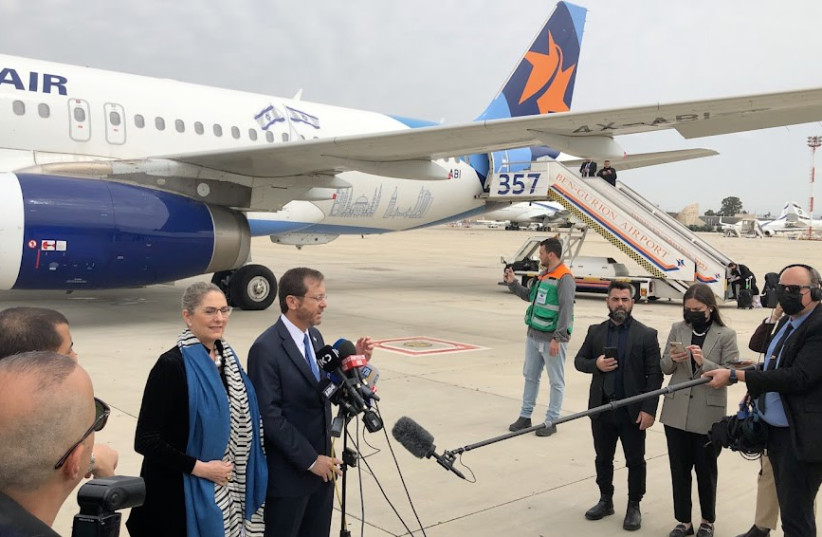 President Isaac Herzog and First Lady Michal Herzog prior to boarding a plane to Turkey ahead of a meeting with president Recep Tayyip Erdogan on March 8, 2022 (credit: Lahav Harkov)