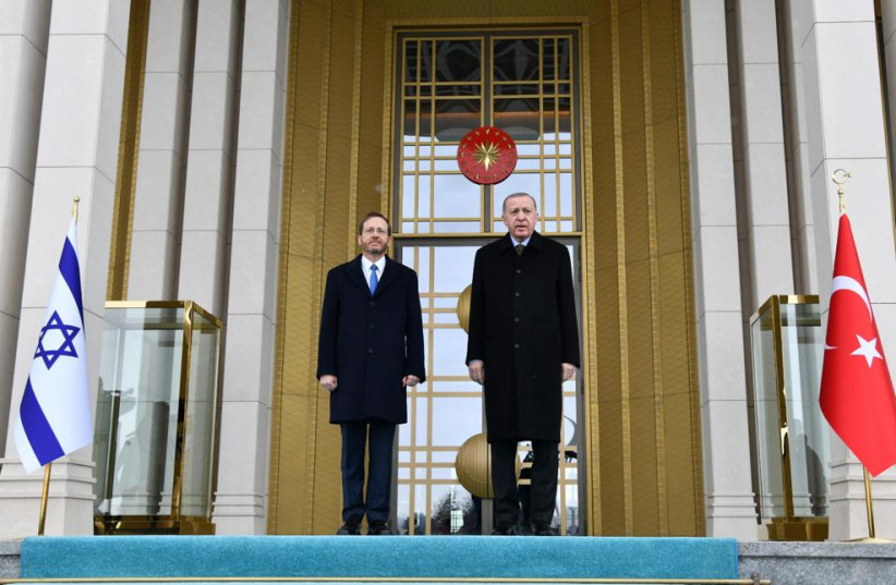 President Isaac Herzog met with Turkish President Recept Tayyip Erdogan in Ankara March 9, 2022. (credit: CHAIM TZACH/GPO)