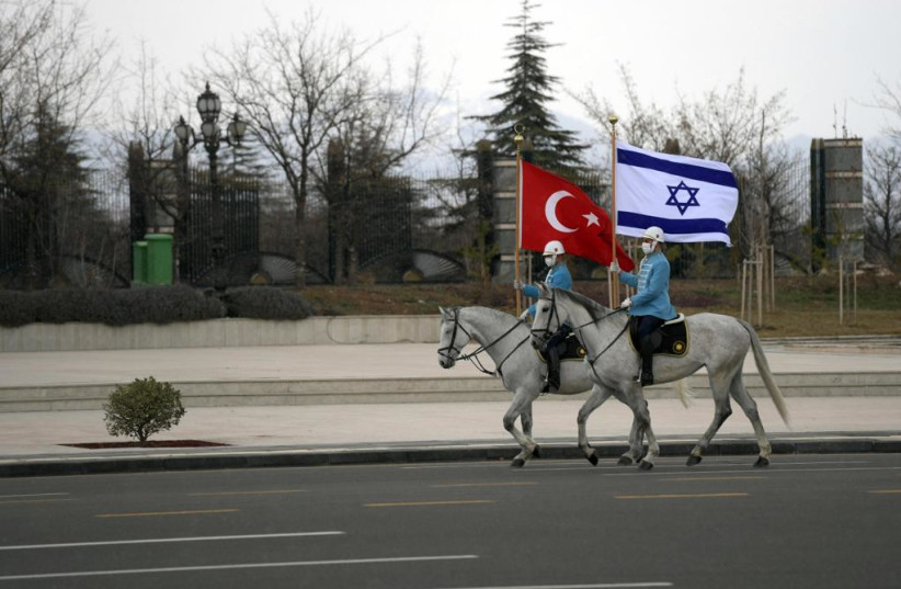  Hatikva plays at Erdogan's palace as Israel resets ties with Turkey March 9, 2022. (photo credit: CHAIM TZACH/GPO)