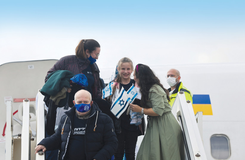  New immigrants are seen arriving in Israel after fleeing Ukraine. (photo credit: NIR ELIAS/REUTERS)