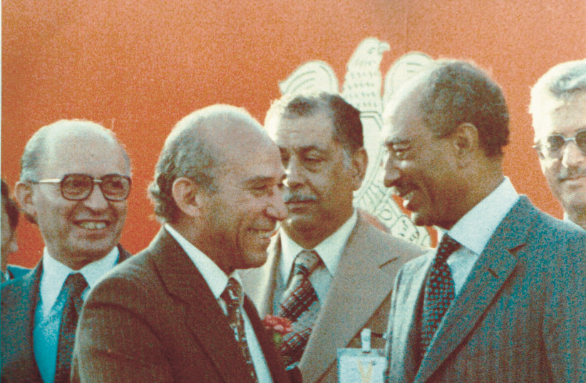  Nessim Gaon greets Egyptian President Anwar Sadat as Begin looks on. (photo credit: BGU)