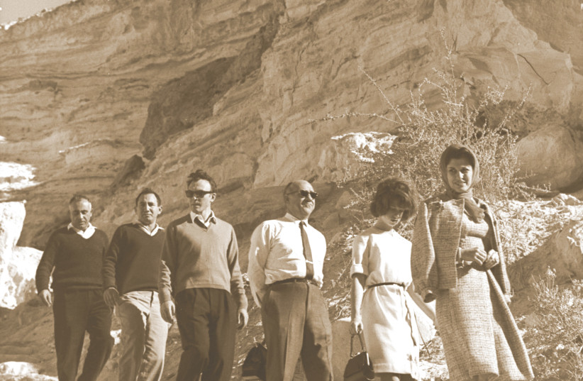  The writer (in white shirt) takes American arts patron Marion Javits, wife of US senator Jacob K. Javits, on a hike near Sde Boker in 1962. (credit: MOSHE PRIDAN / GPO)