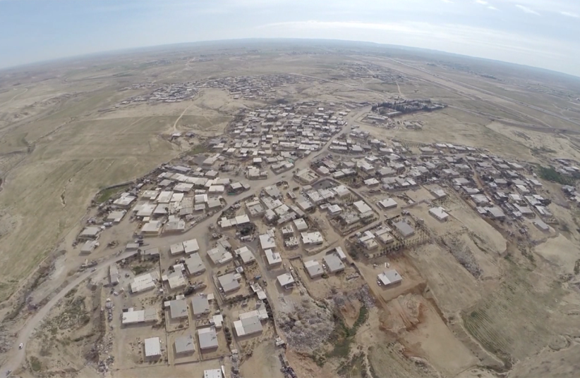  AL-ZARNOUK-ABU QWAIDER illegal Bedouin settlement in the northern Negev, aerial view.  (credit: REGAVIM)