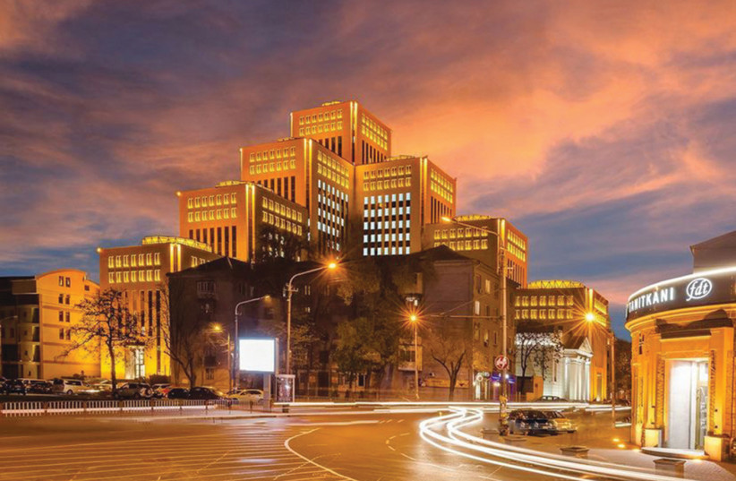  THE MENORAH Center, at night, one of the world’s largest Chabad buildings. (credit: THE MENORAH CENTER)
