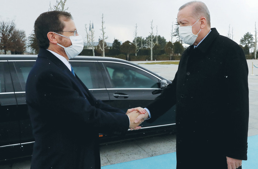  PRESIDENT ISAAC HERZOG is welcomed by Turkish President Recep Tayyip Erdogan in Ankara on Wednesday.  (credit: Presidential Press Unit/Reuters)
