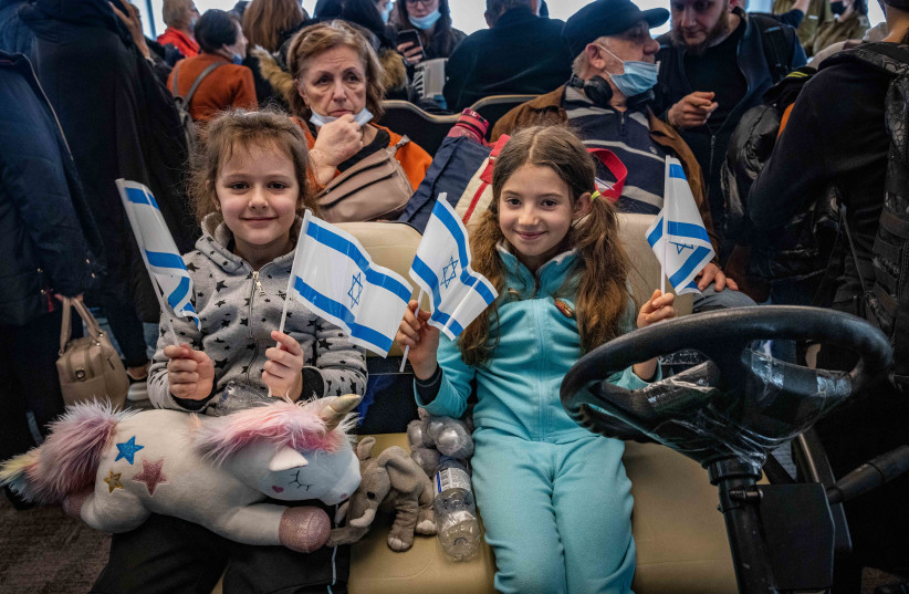  Jewish immigrants fleeing the war in Ukraine, on a rescue flight sponsored by the IFCJ, arrive at Ben Gurion airport near Tel Aviv, March 6, 2022.  (photo credit: NATI SHOHAT/FLASH90)