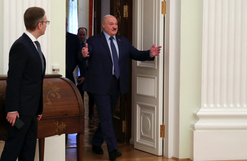  Russian President Vladimir Putin meets with Belarusian President Alexander Lukashenko in Moscow (photo credit: SPUTNIK/MIKHAIL KLIMENTYEV/ VIA REUTERS)