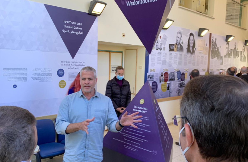  Yaron Tzur, head of the educational department at the Center for Humanistic Education of the Ghetto Fighters' House, unveils a new exhibit honoring Jehovah's Witnesses (photo credit: Trey Upshur)