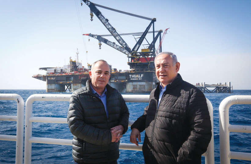  THEN-PRIME MINISTER Benjamin Netanyahu and his energy minister Yuval Steinitz visit the Leviathan gas-processing rig near Caesarea in 2019.  (photo credit: MARC ISRAEL SELLEM/THE JERUSALEM POST)