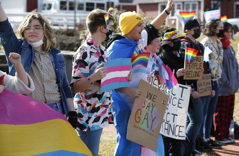  Students at the Norfolk County Agricultural High School in Walpole, Massachusetts march as part of a nationwide student protest over anti-LGBT education policies in Florida and Texas, March 11, 2022.  (credit: JONATHAN WIGGS/THE BOSTON GLOBE VIA GETTY IMAGES)