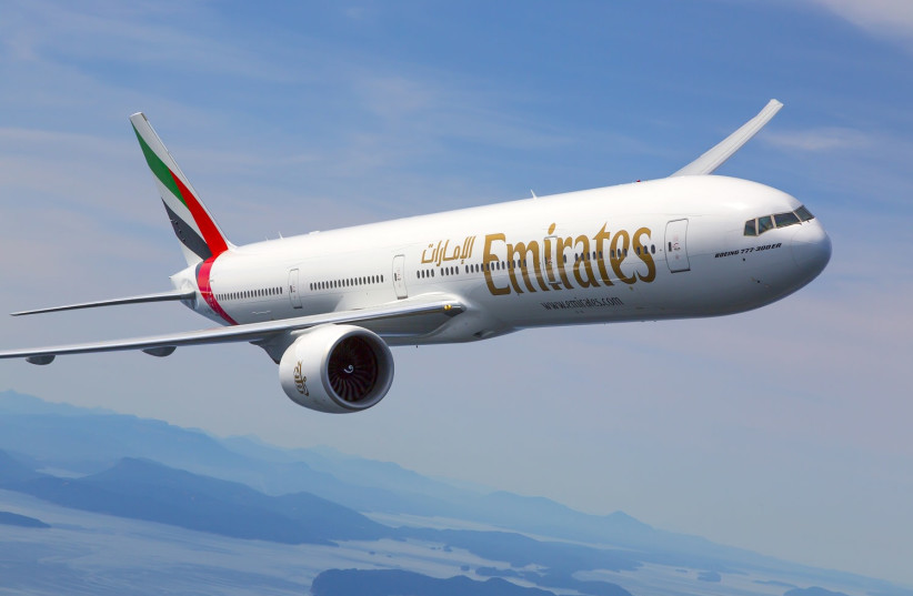  Emirates Air's Boeing 777-300ER in flight. (photo credit: Emirates Airlines PR)