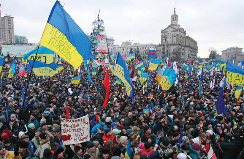  EUROMAIDAN RIOTS that led to today’s war: At Maidan Nezalezhnosti or Independence Square in Kyiv, Dec. 8, 2013. (credit: GLEB GARANICH/REUTERS)