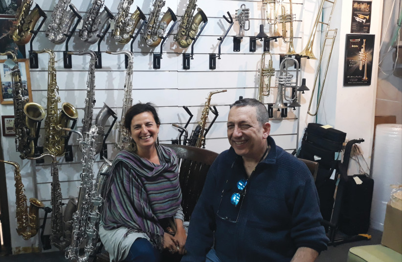  WITH THE writer at the Ginsburg historical musical instruments store. (credit: BASIA MONKA)