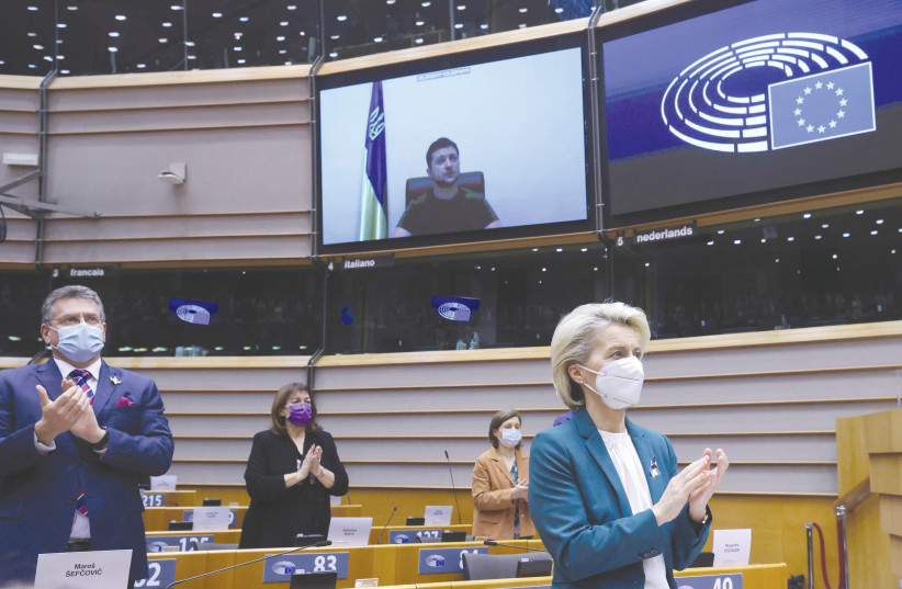  EUROPEAN COMMISSION President Ursula Von Der Leyen and others applaud after Ukrainian President Volodymyr Zelensky’s speech at the European Parliament earlier this month. Like Esther, ‘he appealed... for his people’ to the EU. (photo credit: YVES HERMAN/REUTERS)