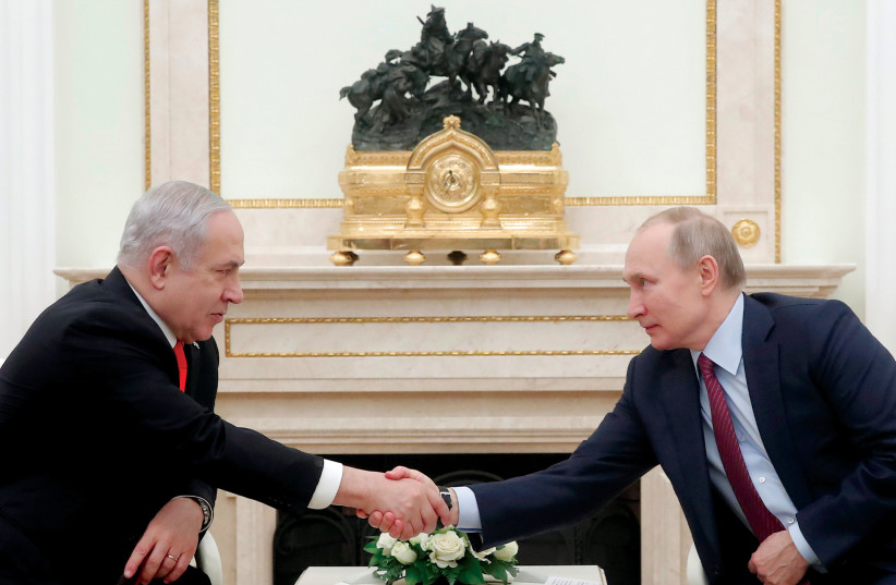  BENJAMIN NETANYAHU and Vladimir Putin reached understandings that allow Israel freedom to act and Naftali Bennett is eager to retain them. (photo credit: MAXIM SHEMETOV/REUTERS)