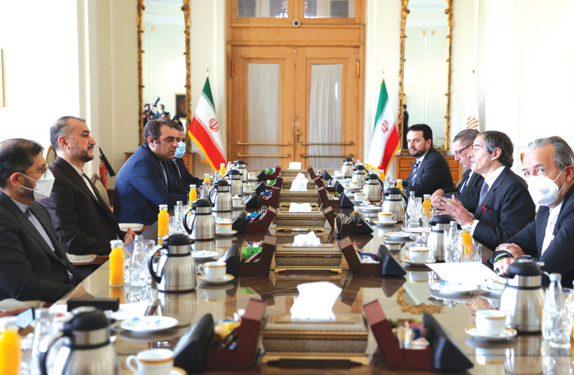  IRANIAN FOREIGN Minister Hossein Amir-Abdollahian (2nd-L) meets with head of the International Atomic Energy Agency Rafael Grossi (2nd-R) in Tehran on March 5. (photo credit: Atta Kenare/AFP via Getty Images)