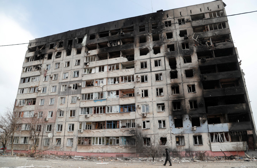  A view shows a block of flats, which was destroyed during Ukraine-Russia conflict in the besieged southern port city of Mariupol, Ukraine March 17, 2022. (photo credit: Alexander Ermochenko/Reuters)