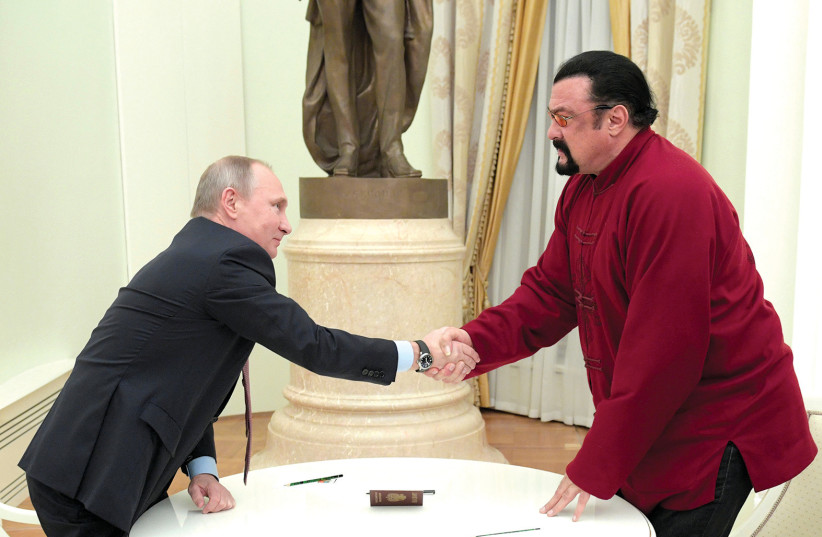  Putin and Steven Segal (photo credit: REUTERS)