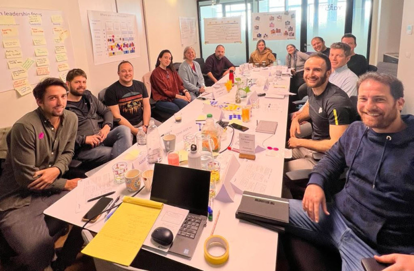  TAU Ventures participants in a meeting. (credit: TAU Ventures)
