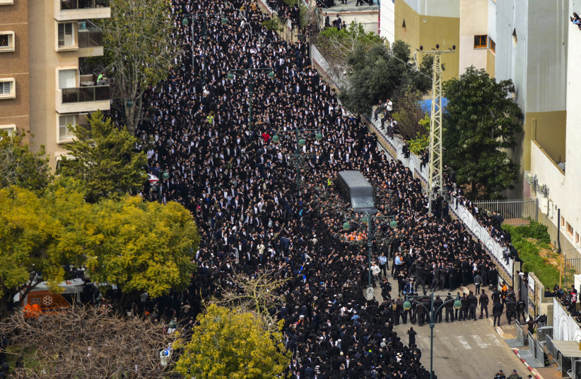  Ultra-Orthodox Jews attend the funeral ceremony of Rabbi Chaim Kanievsky at the cemetery in the city of Bnei Brak, on March 20, 2022.  (photo credit: TOMER NEUBERG/FLASH90)