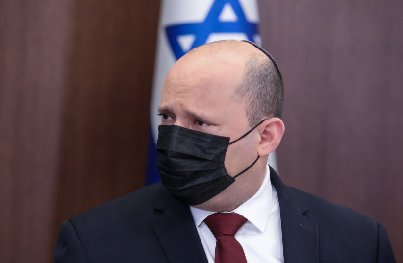 Prime Minister Naftali Bennett attends a cabinet meeting, March 20, 2022. (credit: MARC ISRAEL SELLEM/THE JERUSALEM POST)