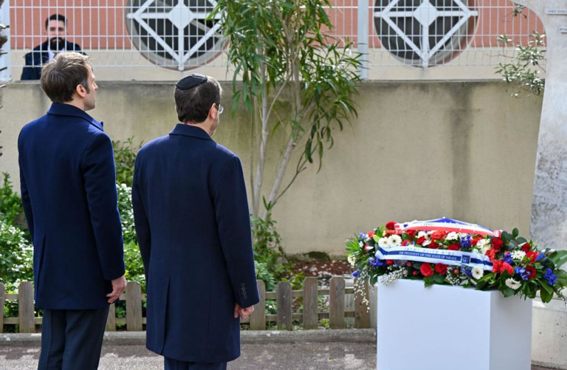French President Emmanuel Macron (L) and Israeli President Isaac Herzog at the Ohr Torah Jewish school in Toulouse, France. (photo credit: KOBI GIDEON/GPO)