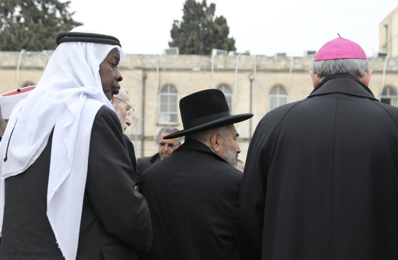  Religious leaders from different religions met at Moskva Square in Jerusalem on March 21 in order to call on Patriarch Kirill of Moscow, the Primate of the Russia Orthodox Church, to use his position and power to achieve peace between Russia and Ukraine. (photo credit: MARC ISRAEL SELLEM)