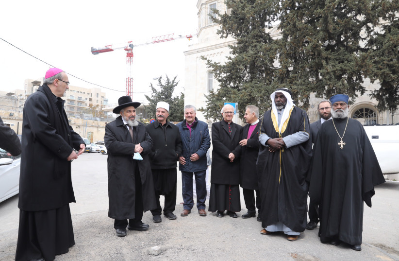   Religious leaders from different religions met at Moskva Square in Jerusalem on March 21 in order to call on Patriarch Kirill of Moscow, the Primate of the Russia Orthodox Church, to use his position and power to achieve peace between Russia and Ukraine. (credit: MARC ISRAEL SELLEM)