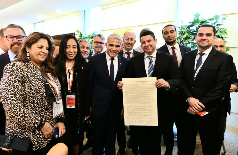  Christian MPs present Foreign Minister Yair Lapid with a declaration promoting the “vigorous application “of the IHRA working definition of antisemitism (photo credit: AVI HAYUN)