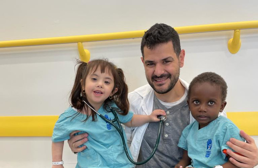  the children of the Save a Child's Heart (SACH) dressed up as the doctors who saved their lives (photo credit: SAVE A CHILD'S HEART)
