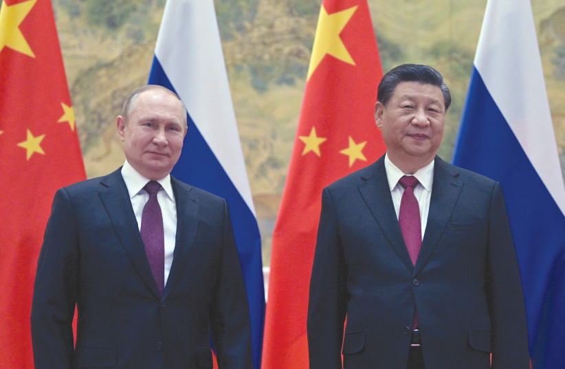  RUSSIAN PRESIDENT Vladimir Putin meets with Chinese President Xi Jinping in Beijing last month.  (credit: Sputnik/Kremlin/Reuters)
