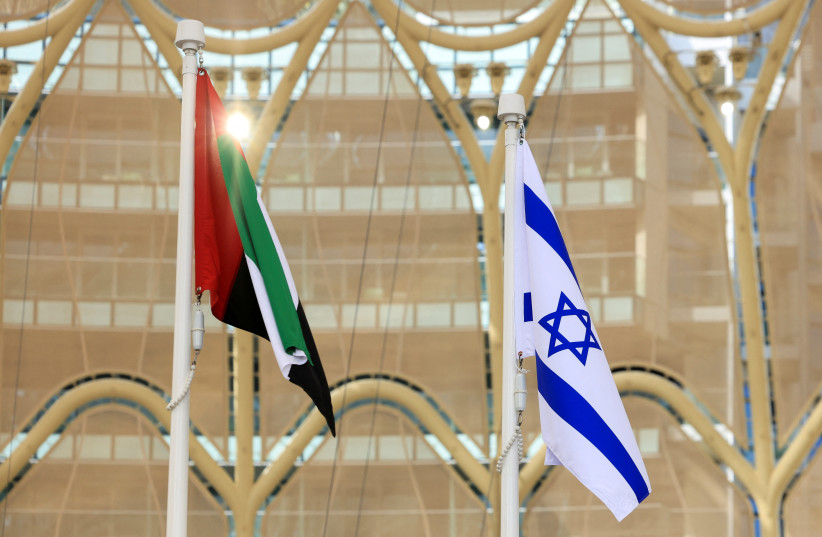  Flags of United Arab Emirates and Israel flutter during Israel's National Day ceremony at Expo 2020 Dubai, in Dubai (credit: REUTERS/CHRISTOPHER PIKE)