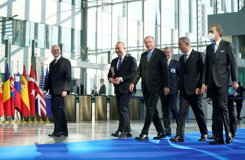  Turkish President Recep Tayyip Erdogan arrives at NATO Headquarters for meetings with NATO allies about the Russian invasion of Ukraine, in Brussels, Belgium March 24, 2022. (credit: EVAN VUCCI/POOL VIA REUTERS)