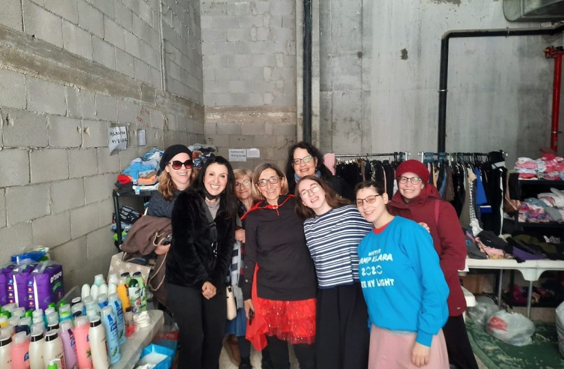  DEPUTY MAYOR Fleur Hassan-Nahoum (L) in the shop with volunteers, including two orphan girls from Dnepro. (credit: FLEUR HASSAN-NAHOUM)