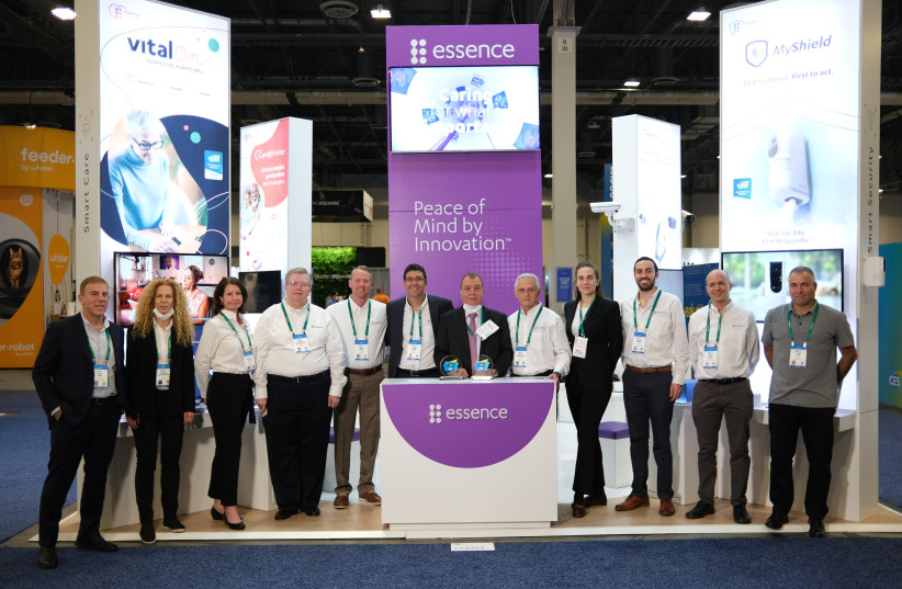  CEO DR. HAIM AMIR (M) with the Essence Group team at the CES trade show in Las Vegas.  (photo credit: Courtesy Essence)