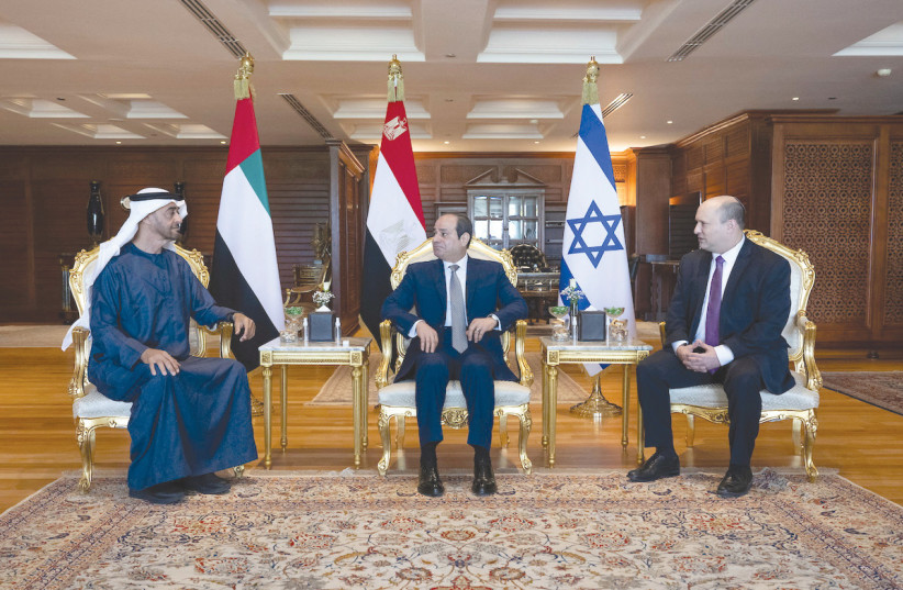 EGYPTIAN PRESIDENT Abdel Fattah al-Sisi (center) meets with Abu Dhabi Crown Prince Sheikh Mohammed bin Zayed Al Nahyan and Prime Minister Naftali Bennett in Sharm e-Sheikh on Tuesday. (photo credit: UAE MINISTRY OF PRESIDENTIAL AFFAIRS/REUTERS)