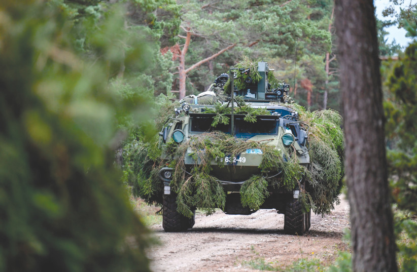 A FINNISH armored terrain vehicle, Patria, is seen during a drill between Finnish and Swedish troops at Tofta shooting field on the Swedish island Gotland in 2017. (photo credit: Anders Wiklund/AFP via Getty Images)