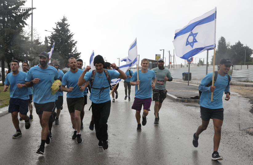   Runners at the Jerusalem Marathon 2022, March 25, 2022.  (credit: MARC ISRAEL SELLEM/THE JERUSALEM POST)