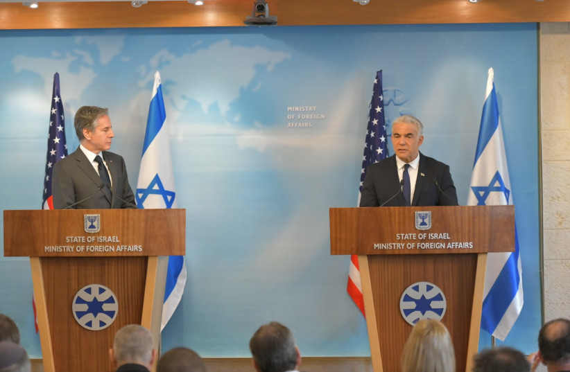 Foreign Minister Yair Lapid and US Secretary of State Antony Blinken in a joint press conference March 27, 2022. (credit: SHLOMI AMSALEM)