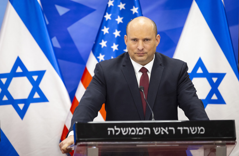  Prime Minister Naftali Bennett at a joint press conference with US Secretary of State Yair Lapid, March 27, 2022.  (credit: OLIVIER FITOUSSI/FLASH90)