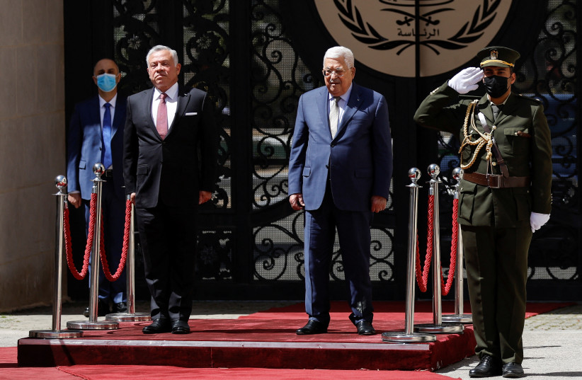  Jordanian King Abdullah meets with Palestinian President Mahmoud Abbas in Ramallah, in the West Bank March 28, 2022.  (photo credit: REUTERS/MOHAMAD TOROKMAN)